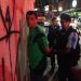 Um dos mexicanos detidos após a agressão (Foto: Diario Récord)