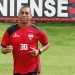 Pituca com a camisa do Atlético