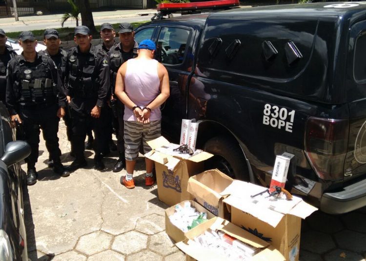 Dono da distribuidora preso por policiais do Bope (Foto: Divulgação/PM)