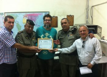 Homenagem prestada ao experiente jornalista Ulisses Aesse na redação do jornal "Diário da Manhã"