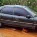 Criança ficou presa debaix de carro após ser arrastada pela enxurrada em Pires do Rio (GO) | Foto: Corpo de Bombeiros / Divulgação